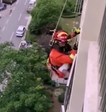Firefighters Rescue People Trapped on Balconies