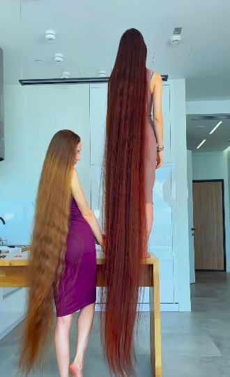 With 90-inches of flowing brown locks, this real life Rapunzel has hair brushing the ground behind her.